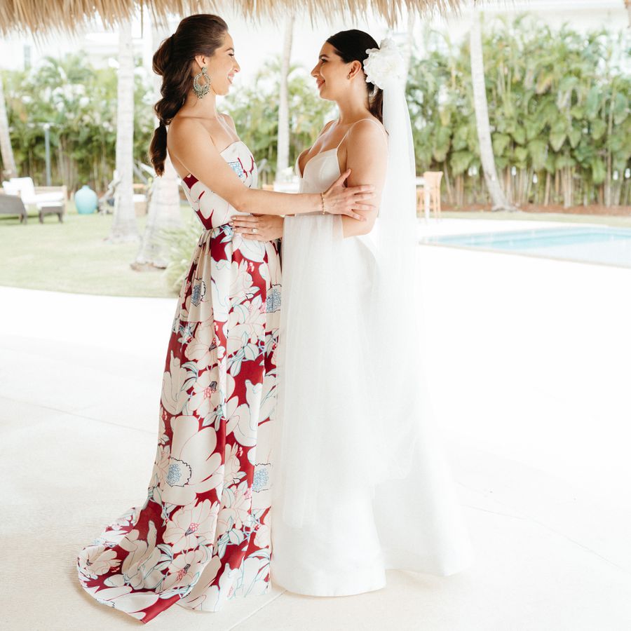 Bride and her sister looking at each other