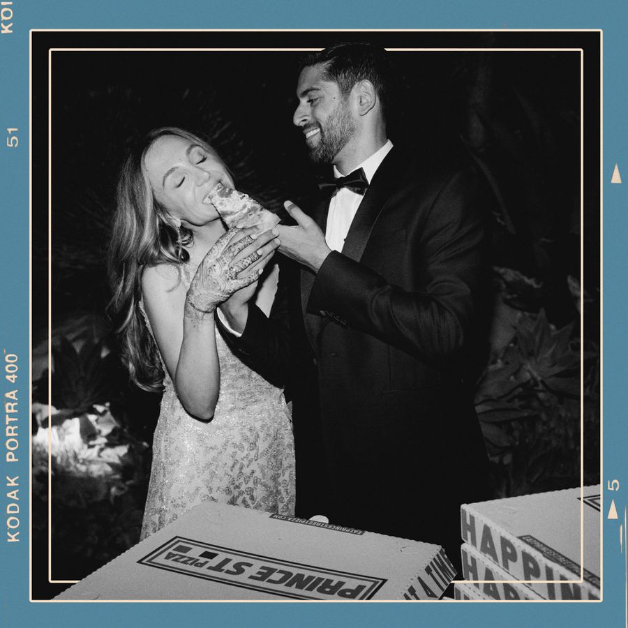 Bride and Groom Eating Pizza