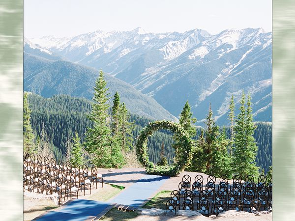 Mountain Wedding Ceremony Space with Round Greenery Altar