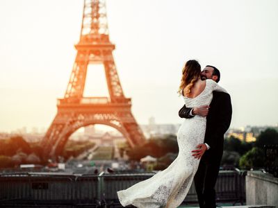 A bride and groom embrace during their destination wedding in Paris, France.