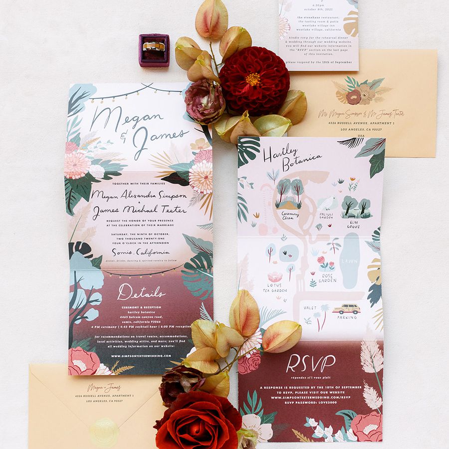 Colorful fall wedding invitation suite with save-the-date, invitation, and fresh flowers.