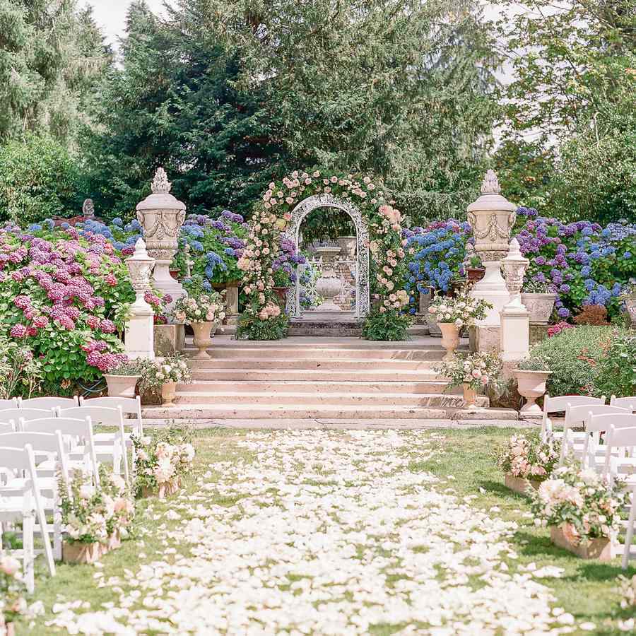 Ceremony in a garden with colorful flowers