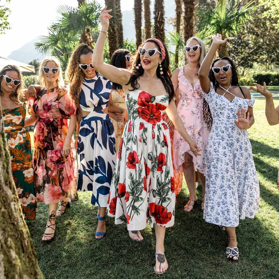 wedding guests in sundresses and heart sunglasses